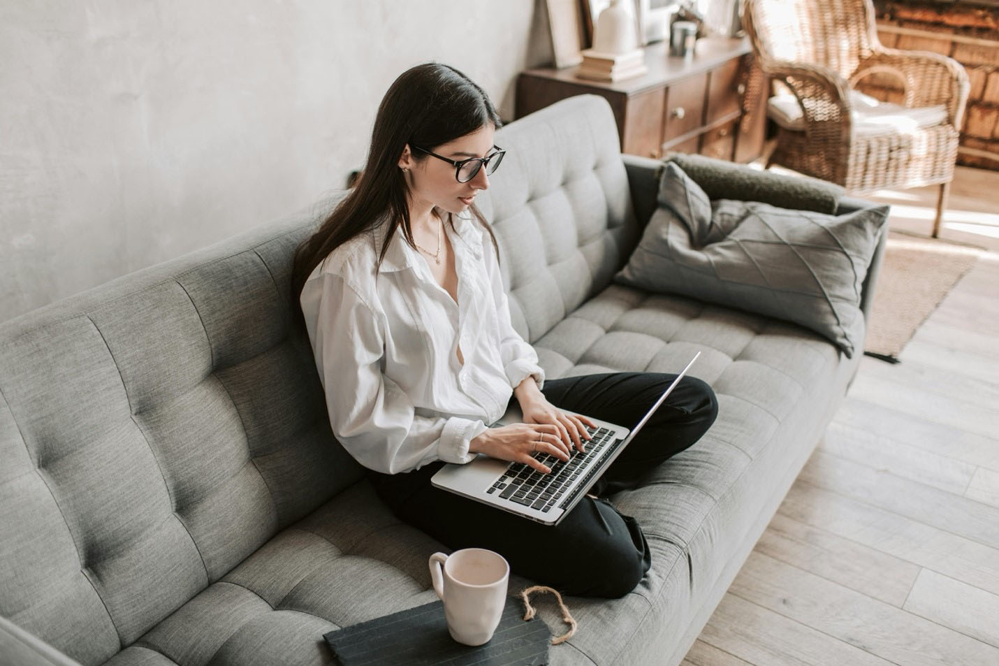 A woman working from her laptop